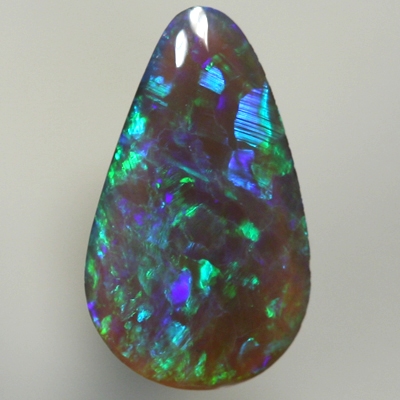 SOLID BLACK CRYSTAL OPAL Sparkles of green and blue 